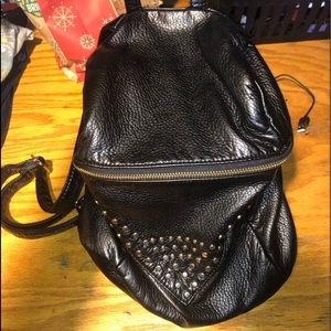 Cute “leather” backpack purse.